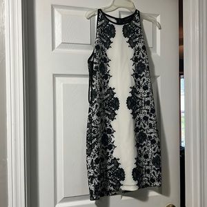 Black and white mini dress size 13-14 fits more like a 11-12